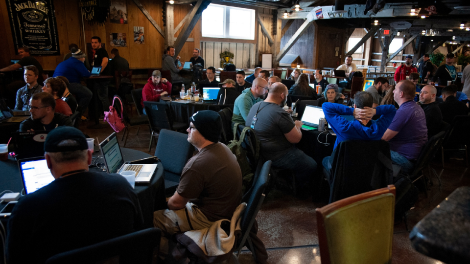A bunch of hackers at Wild West Hackin' Fest at the Deadwood Mountain Grand Hotel.